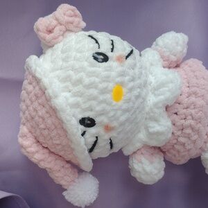 Pink and White Stuffed Animal Toy